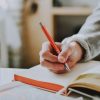 Doctoral writing through a trajectorial lens: an exploratory study on challenges, strategies and relationships